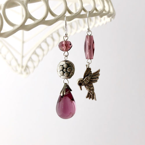 asymmetric earrings in amethyst and silver with hummingbird and flower bead
