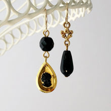Load image into Gallery viewer, black and gold cameo earrings with black and gold beads hanging from a wire  frame
