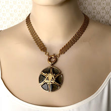 Load image into Gallery viewer, dramatic heraldic pendant on vintage brick chain necklace displayed on a mannequin
