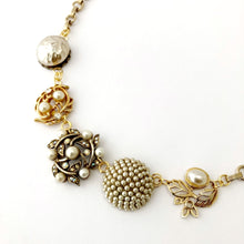 Load image into Gallery viewer, close up of necklace made with five vintage champagne pearl earrings and vintage chain on a white background
