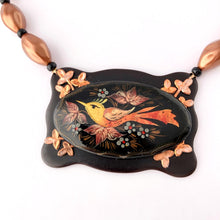 Load image into Gallery viewer, close up of necklace focal showing the hand-painted and foiled bird
