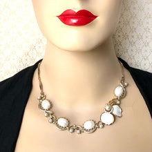 Load image into Gallery viewer, mannequin wearing a necklace made with vintage choker fragments and a single flower earring
