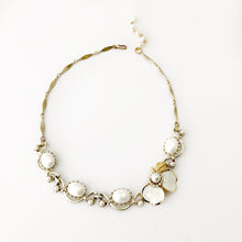 Load image into Gallery viewer, necklace made with vintage choker fragments and a single flower earring on a white background
