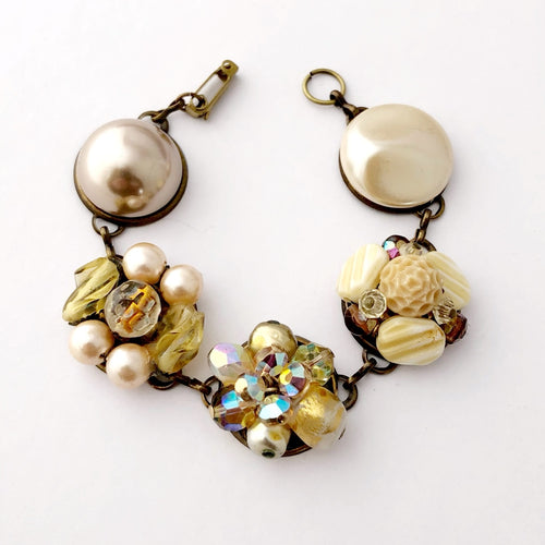 bracelet made with deep gold and cream coloured vintage earrings 